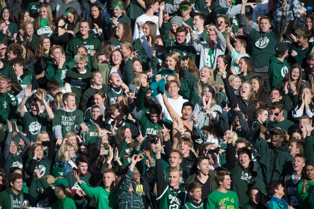 (Rick Egan  |  The Salt Lake Tribune)     Olympus fans celebrate an early touchdown by running back Tommy Poulton (2), in 5A football semifinal action between Olympus and Corner Canyon at Rice-Eccles Stadium, Thursday, Nov. 8, 2018.
