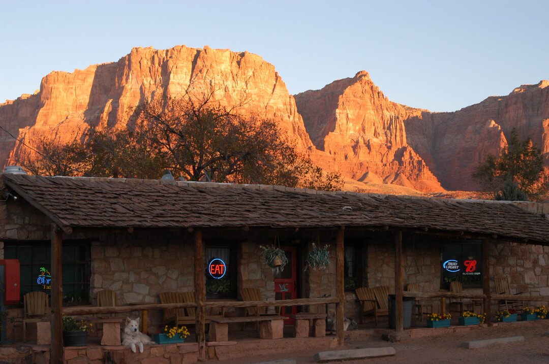 (Tribune File Photo)  The Vermilion Cliffs tower over the Lees Ferry Lodge in northern Arizona.