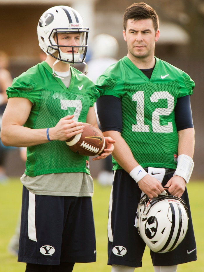 Rick Egan  |  The Salt Lake TribuneBYU quarterbacks Beau Hoge (7) and  Tanner Mangum (12) prepare for the second day of spring practice, in Provo, Thursday, March 3, 2016.