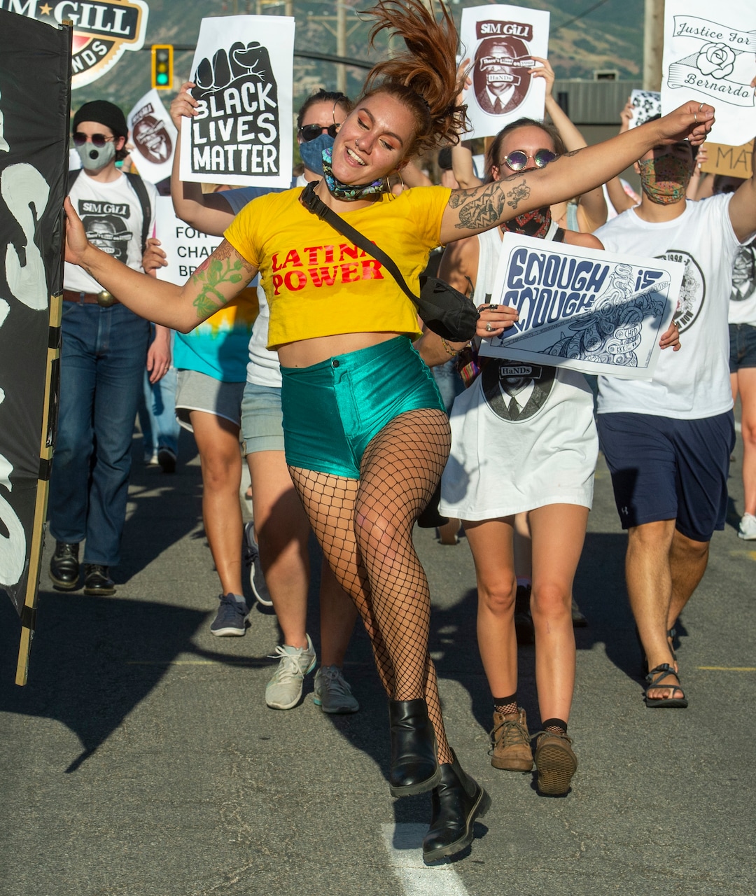 (Rick Egan  |  The Salt Lake Tribune)    Natalie Montangue dances in the street,   during the Dance Dance For Revolution protest for racial equality, on Sunday, Aug. 9, 2020.