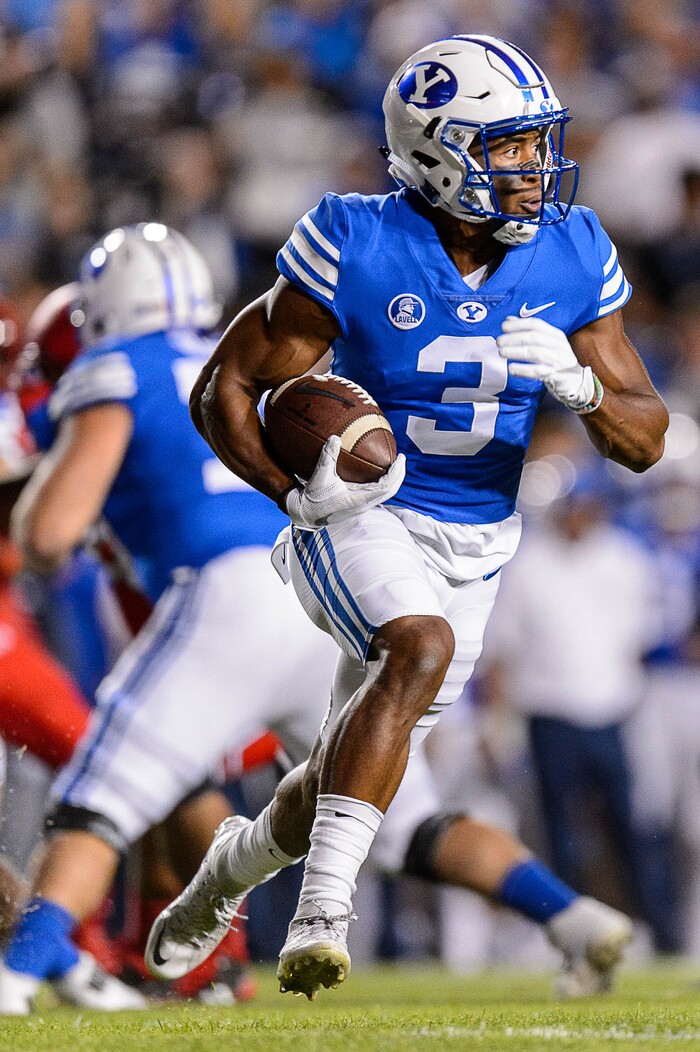 (Trent Nelson | The Salt Lake Tribune)  Brigham Young Cougars wide receiver Jonah Trinnaman (3) runs the ball as BYU hosts Utah, NCAA football in Provo, Saturday September 9, 2017.