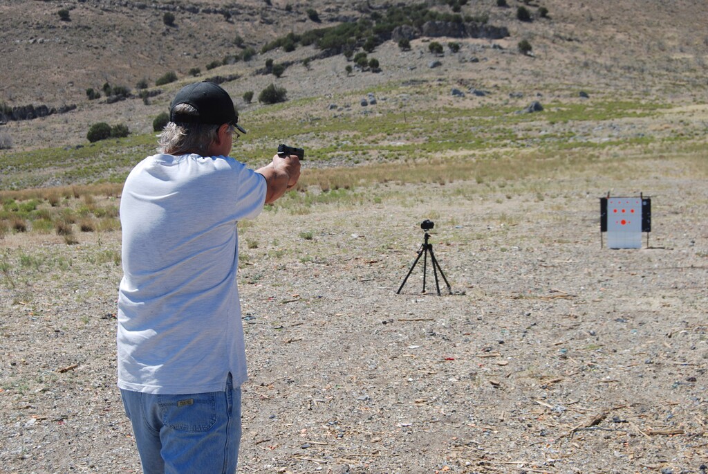 (Brian Maffly | Tribune file photo) A man, who identified himself as Tony, takes aim at paper targets with a 9mm handgun on public lands west of Utah Lake. The Bureau of Land Management has initiated a public process to revise a management plan on a 9,000-acre area on the Lake Mountains to help curb impacts associated with target shooting, including dumping, damage to ancient rock art, wildland fire, and threats to public safety. Now, the state Division of Wildlife Resources has closed an area near Santaquin, east of I-15, to target shooting.