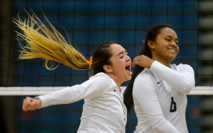 (Steve Griffin | The Salt Lake Tribune) Mercedes George screams her excitement as Copper Hills takes the first game against Herriman's during volleyball match at Copper Hills High School in West Jordan Tuesday September 26, 2017.