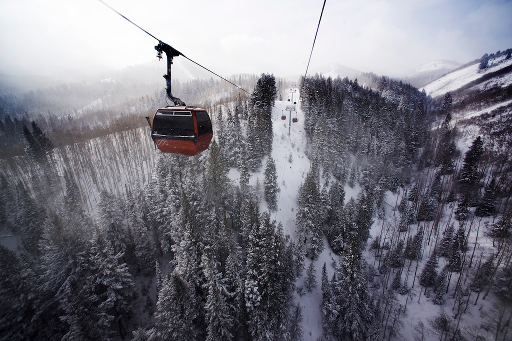 Rick Egan  |  The Salt Lake Tribune

The Red Pine Gondola transports skiers at The Canyons Resort, Friday, December 26, 2014. Because the lift spans deep valleys, it often is put on wind hold. Park City Mountain wants to build the Sunrise Gondola, which will run in conjunction with the Red Pine Gondola and also terminate at the Red Pine Lodge but will follow the contours of the mountain to avoid wind issues.