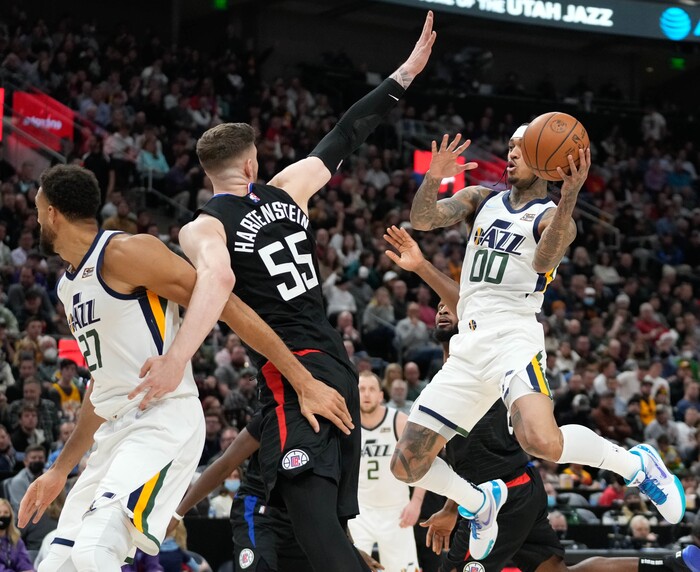 (Francisco Kjolseth | The Salt Lake Tribune) Utah Jazz guard Jordan Clarkson (00) looks for an opening in NBA action between the Utah Jazz and the LA Clippers at Vivint Smart Home Arena in Salt Lake City, Wednesday, Dec. 15, 2021.