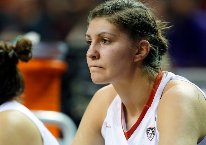 Utah forward Emily Potter sits on the bench after fouling out during overtime of an NCAA college basketball game against California in the Pac-12 Conference tournament, Thursday, March 3, 2016, in Seattle. California beat Utah 66-63 in overtime. (AP Photo/Ted S. Warren)