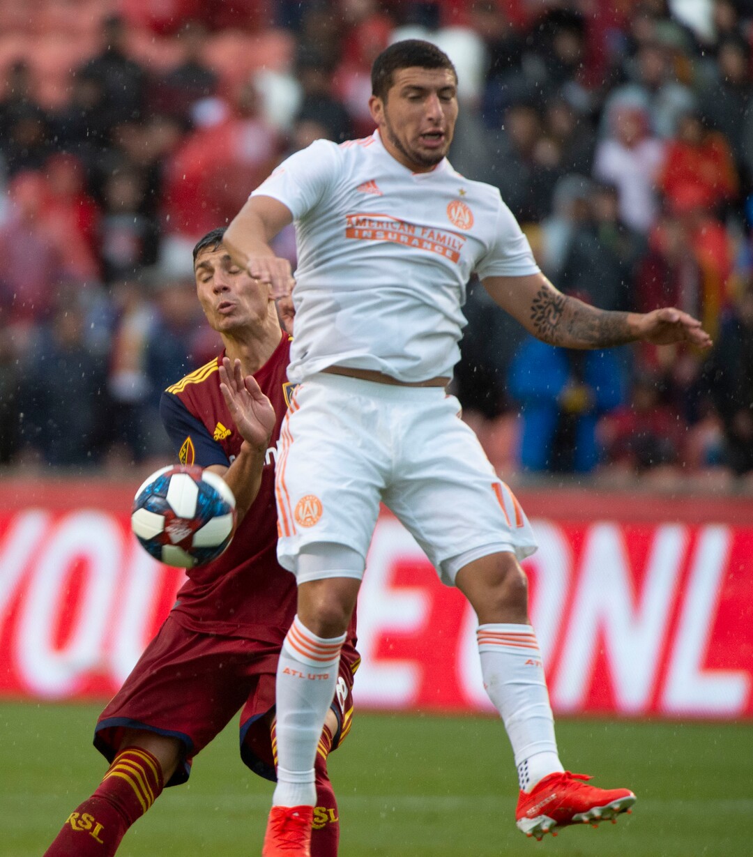 (Rick Egan  |  The Salt Lake Tribune).  Real Salt Lake midfielder Damir Kreilach (8) goes for the ball along with Atlanta United midfielder Eric Remedi (11), in MLS soccer action between Real Salt Lake and Atlanta United at Rio Tinto Stadium in Sandy, Friday, May 24, 2019.