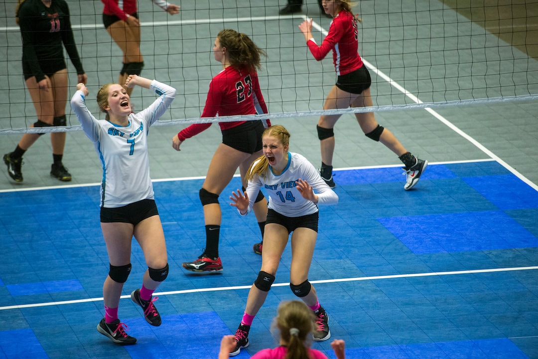  (Chris Detrick  |  The Salt Lake Tribune)  Sky View's Kristen Schumann (14) and Sky View's Mikayla Dockery (7) celebrate scoring a point during the the 4A volleyball state championships at the UCCU Center at Utah Valley University Thursday, October 26, 2017.  