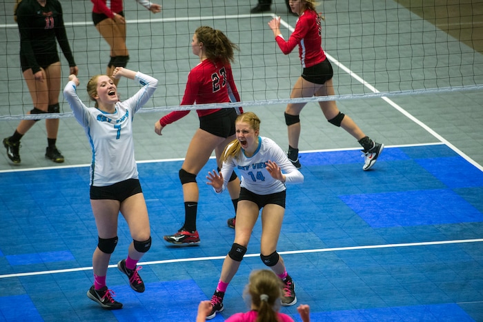  (Chris Detrick  |  The Salt Lake Tribune)  Sky View's Kristen Schumann (14) and Sky View's Mikayla Dockery (7) celebrate scoring a point during the the 4A volleyball state championships at the UCCU Center at Utah Valley University Thursday, October 26, 2017.  