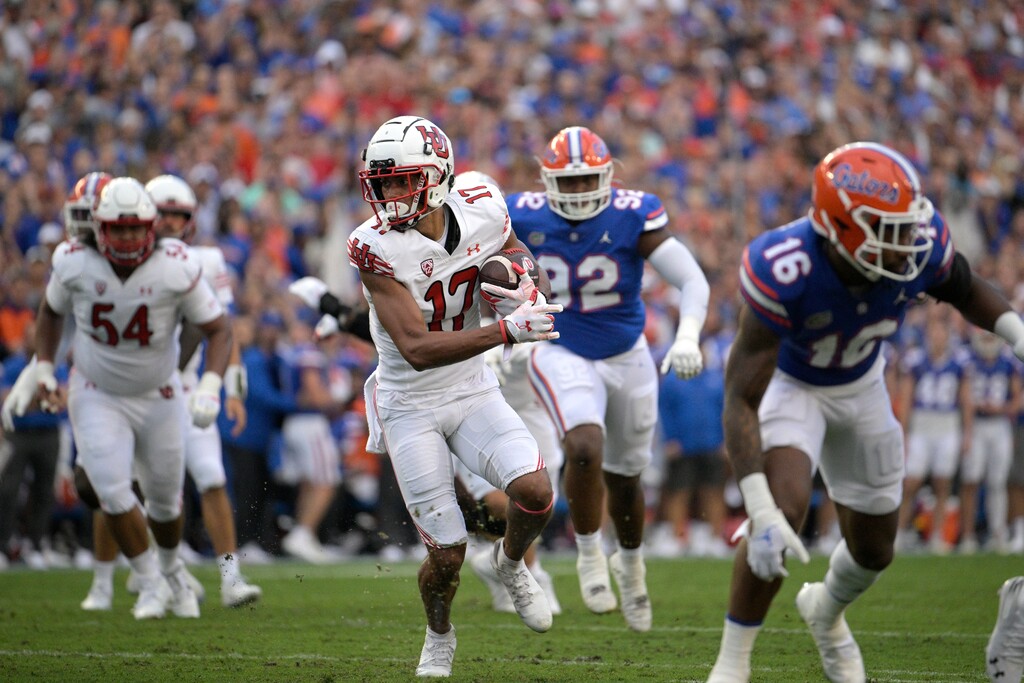 (Phelan M. Ebenhack | AP) Utah wide receiver Devaughn Vele (17) runs after catching a pass during the first half of an NCAA college football game against Florida, Saturday, Sept. 3, 2022, in Gainesville, Fla.