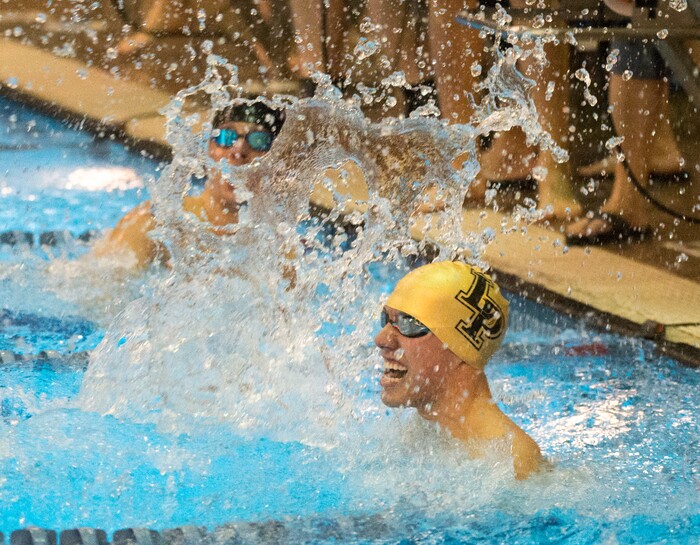 (Rick Egan  |  The Salt Lake Tribune)    Lone Peak Swimmer Johnnie Condie celebrates Lone Peak's state championship in the 200 Yard Freestyle relay, in 6A State Swimming Championships in Bountiful, Friday, February 9, 2018.