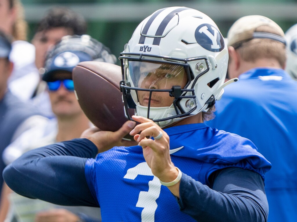 (Rick Egan | The Salt Lake Tribune)  BYU quarterback Jaren Hall, throws the ball, during scrimmage, on day 1 of fall camp, on Thursday, Aug. 4, 2022.