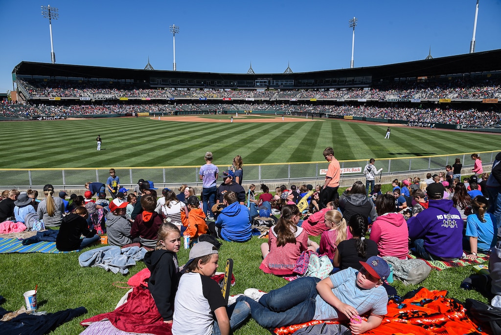 (Francisco Kjolseth  |  Francisco Kjolseth)   The outfield is filled with people taking in a Bees game at Smith's Ballpark on Thursday, May 2, 2019.   