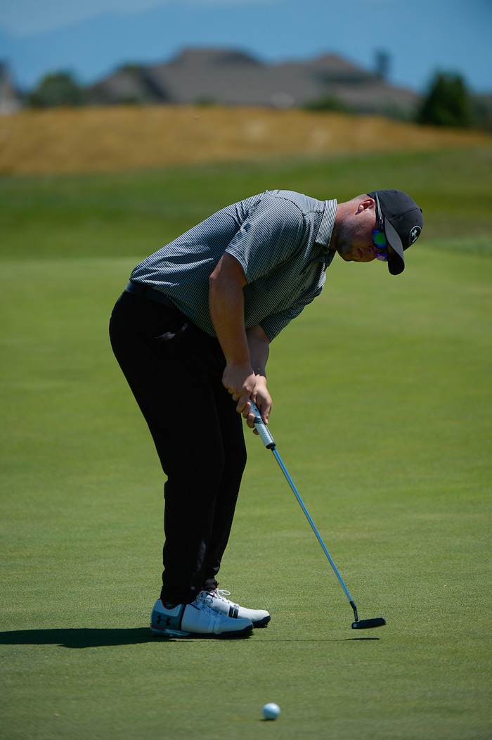 (Francisco Kjolseth  |  The Salt Lake Tribune)  Dalton Stanger of Orem finishes his first nine as he joins a mixture of local pros and nationwide travelers making their annual attempt to qualifying for the Utah Championship on the Web.com Tour and a shot to play in a PGA Tour-brand event at Talons Cove Golf Course in Saratoga Springs on Monday, July 7, 2018. Only 12 players advance from a field of roughly 140.