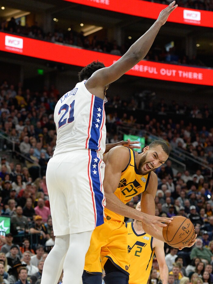 (Francisco Kjolseth  |  The Salt Lake Tribune)  Philadelphia 76ers center Joel Embiid (21) blocks Utah Jazz center Rudy Gobert (27) as the Utah Jazz host the Philadelphia 76ers in their NBA basketball game at Vivint Smart Home Arena in Salt Lake City on Wed. Nov. 6, 2019.