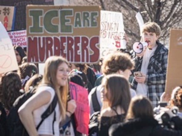 (Rad Thornberry | The City Journal) Bountiful High student John Alley leads a rally Jan. 30, 2026, in front of the school to protest ICE. The kids walked out of their third period class to stage the demonstration.
