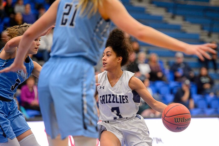 (Trent Nelson | The Salt Lake Tribune)  Copper Hills's Eleyana Tafisi (3) defended by Layton's Corinne Case (3) as Layton faces Copper Hills in the 6A High School Girls' Basketball Tournament at SLCC in Taylorsville, Thursday Feb. 22, 2018.