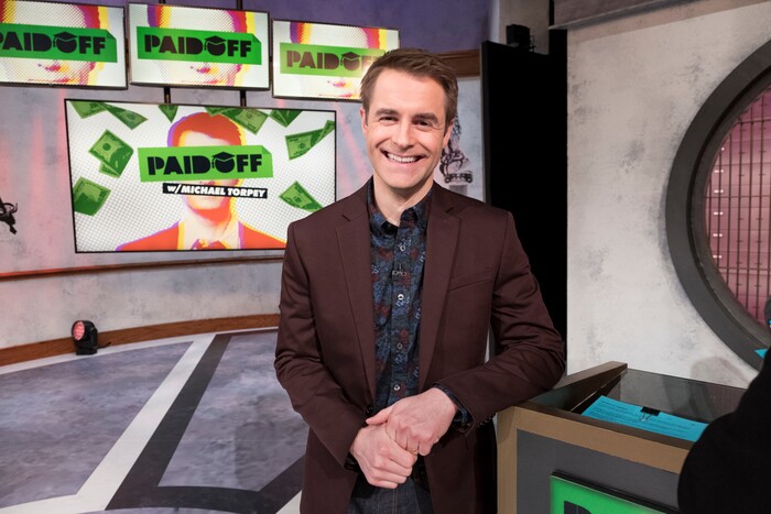 (Photo courtesy of truTV) Host Michael Torpey on the set of "Paid Off."