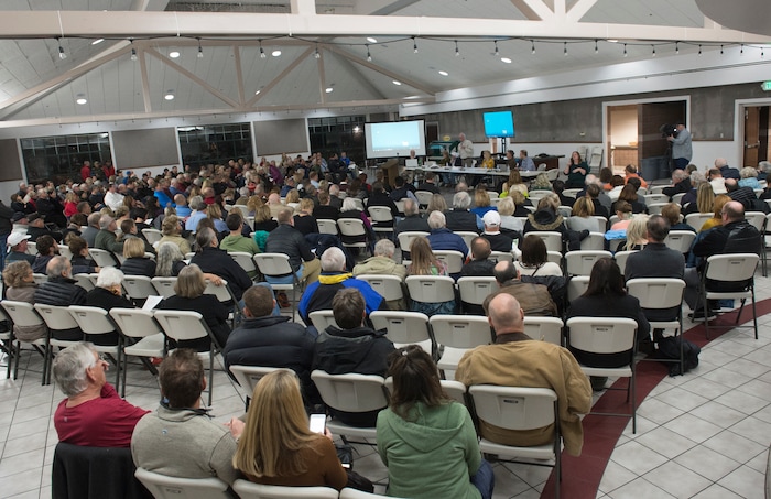 (Rick Egan  |  The Salt Lake Tribune)  Hundreds of concerned citizens gather at the St Vincent De Paul Catholic School for a public hearing about the developers plans for the old Cottonwood Mall site. Wednesday, December 13, 2017.


