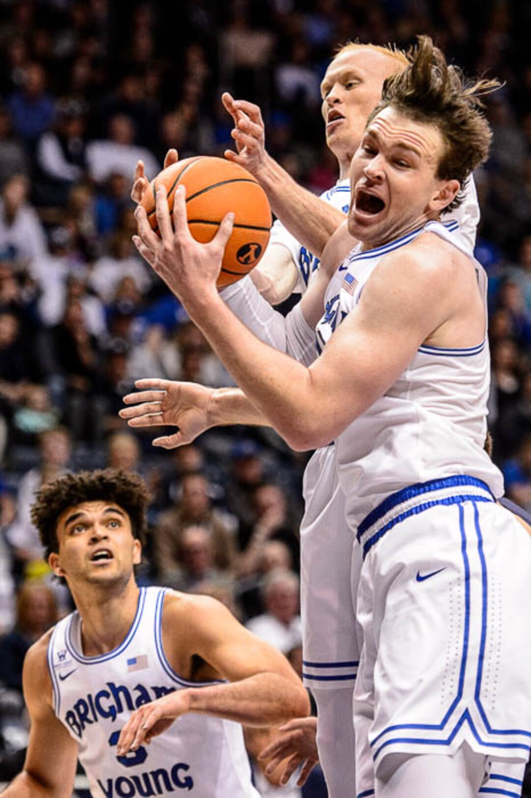 (Trent Nelson | The Salt Lake Tribune)   Brigham Young Cougars forward Payton Dastrup (15) pulls in a rebound as BYU hosts the St. Mary's Gaels, NCAA basketball in Provo, Saturday December 30, 2017.