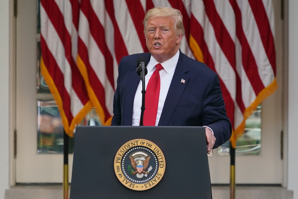 (Evan Vucci | AP file photo) President Donald Trump answers questions from reporters during an event on protecting seniors with diabetes in the Rose Garden White House in Washington on May 26, 2020. On Tuesday, Twitter took the unprecedented step of adding fact-check alerts to two of Trump’s tweets about voting by mail. The next day the president threatened social media companies with new regulation or even shuttering.