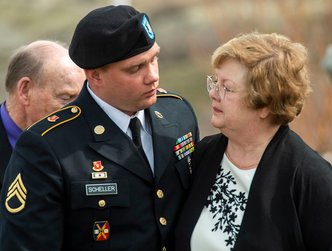 (Rick Egan  |  The Salt Lake Tribune)     Lt. Scheller, who escorted 2nd Lt. Lynn W. Hadfield from Nebraska, visits with Mary Ann Turner, the daughter of 2nd Lt. Lynn W. Hadfield, at Veterans Memorial Park, in Bluffdale. Thursday, March 21, 2019.