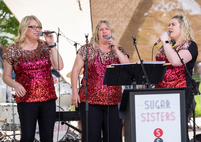 (Rick Egan | The Salt Lake Tribune)  The Sugar Sisters, Kathy Davis, Lisa Dentz and Lexi Davis sing with the Stratford Street Big Band, at the Heart & Soul Music Stroll, in Sugar House, on Saturday, June 10, 2023.