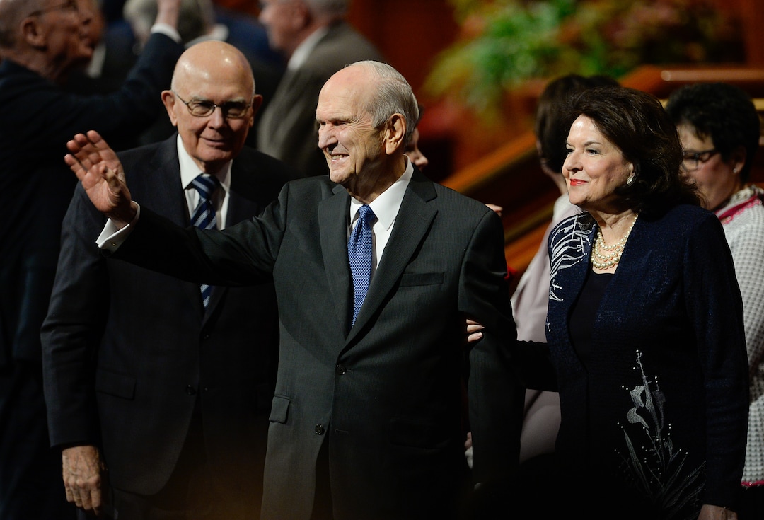 (Francisco Kjolseth  |  The Salt Lake Tribune)  President Russell M. Nelson waves to the crowd as he and his wife, Wendy Nelson, exit at the conclusion of the Sunday morning session of the 189th twice-annual General Conference of The Church of Jesus Christ of Latter-day Saints at the Conference Center in Salt Lake City on Sunday, Oct. 6, 2019. At left is Dallin H. Oaks, first counselor in the First Presidency of The Church of Jesus Christ of Latter-day Saints.