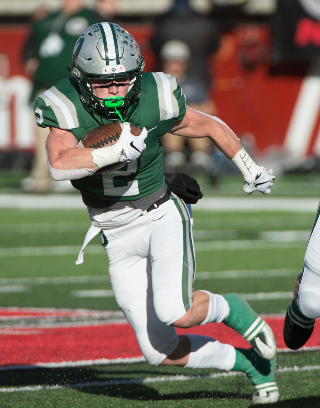 (Rick Egan  |  The Salt Lake Tribune)    Olympus running back Tommy Poulton (2), run for a Titan touchdown, in 5A football semifinal action between Olympus and Corner Canyon at Rice-Eccles Stadium, Thursday, Nov. 8, 2018.
