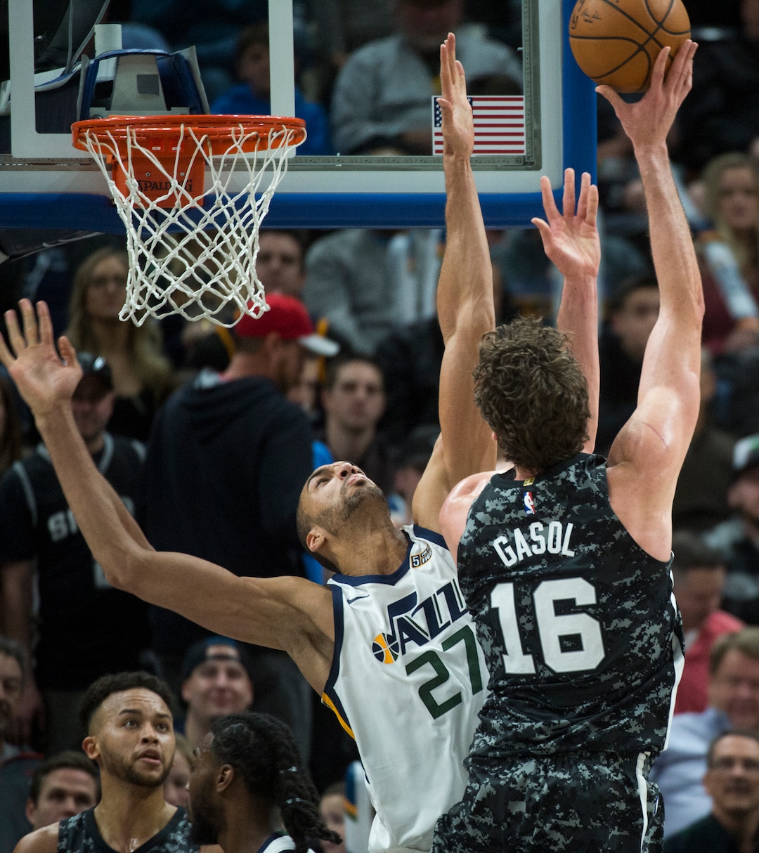 (Rick Egan  |  The Salt Lake Tribune)   San Antonio Spurs center Pau Gasol (16) goes up for a shot, as Utah Jazz center Rudy Gobert (27) defends, in Salt Lake City, Monday, February 12, 2018.