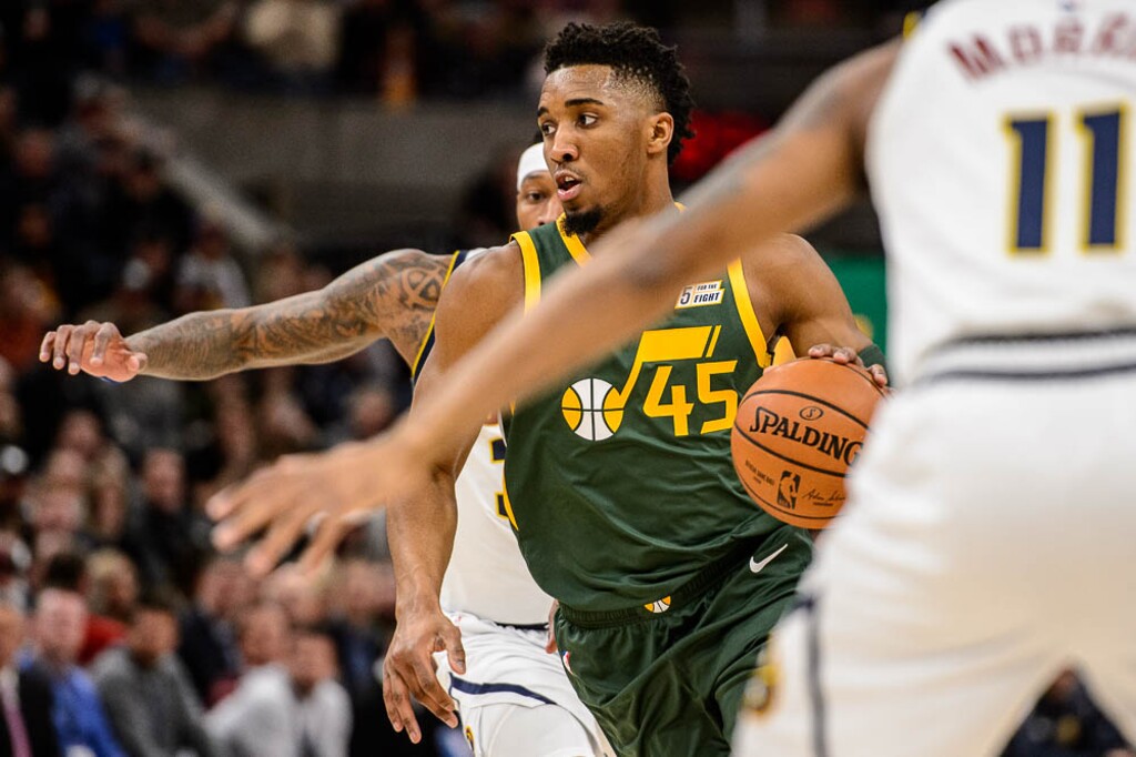 (Trent Nelson | The Salt Lake Tribune)  Utah Jazz guard Donovan Mitchell (45) drives to the basket as the Utah Jazz host the Denver Nuggets, NBA basketball in Salt Lake City on Wednesday Jan. 23, 2019.