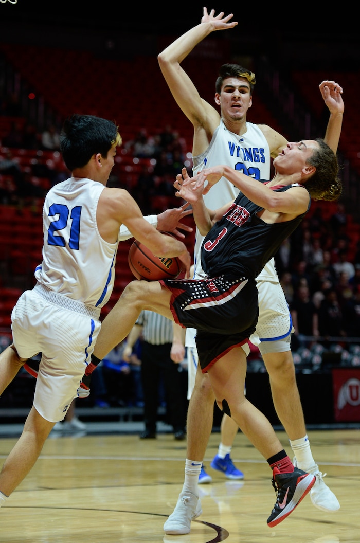 (Francisco Kjolseth  |  The Salt Lake Tribune)  Weber vs Pleasant Grove, 6A State high school basketball tournament at the Huntsman Center in Salt Lake City, Thursday March 1, 2018. Pleasant Grove's Kawika Akina (21) puts the brakes on Hudson Schenck (3). 