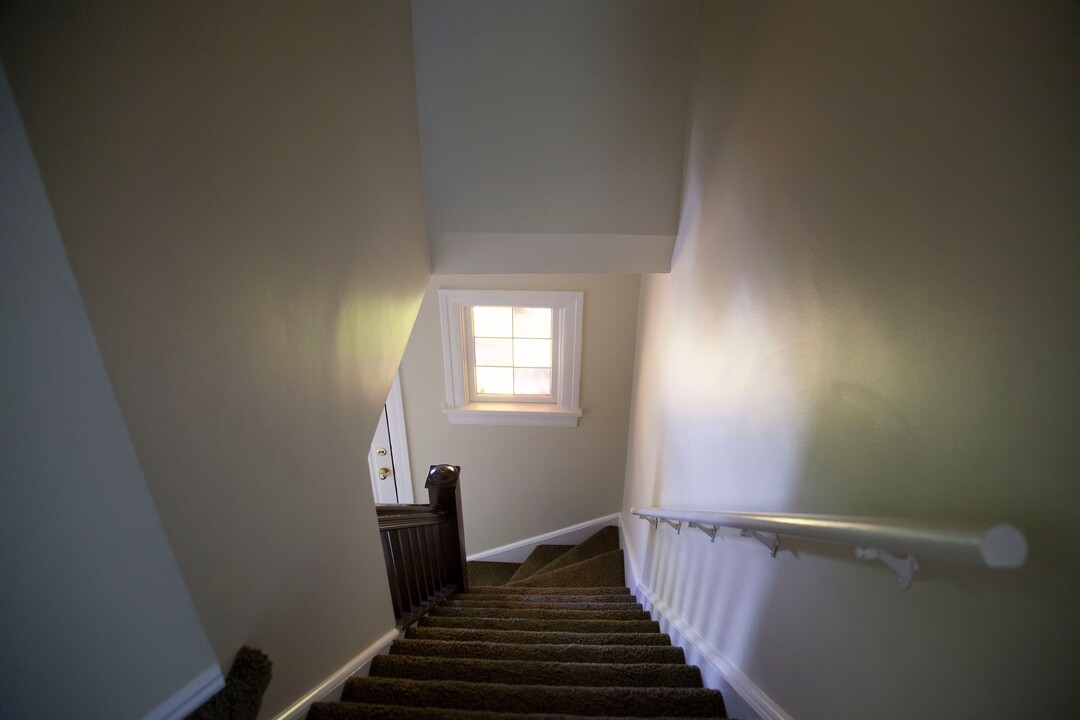 (Stella Yu |  The Salt Lake Tribune) Located at the foot of the state capitol building, the two-story historic home was rebuilt with a new roof, deck and patio cover. The 1,743-square-foot house has two bedrooms, one and a half bath, a livingroom with fireplace, a kitchen, a bar and a formal dining room.