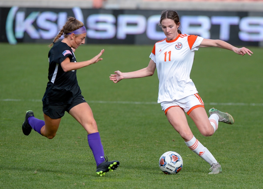 (Chris Samuels | The Salt Lake Tribune) Skyridge Kylie Olsen (11) kicks the ball against Riverton in the 6A girls’ soccer state championships at Rio Tinto Stadium in Sandy, Friday, Oct. 22, 2021.