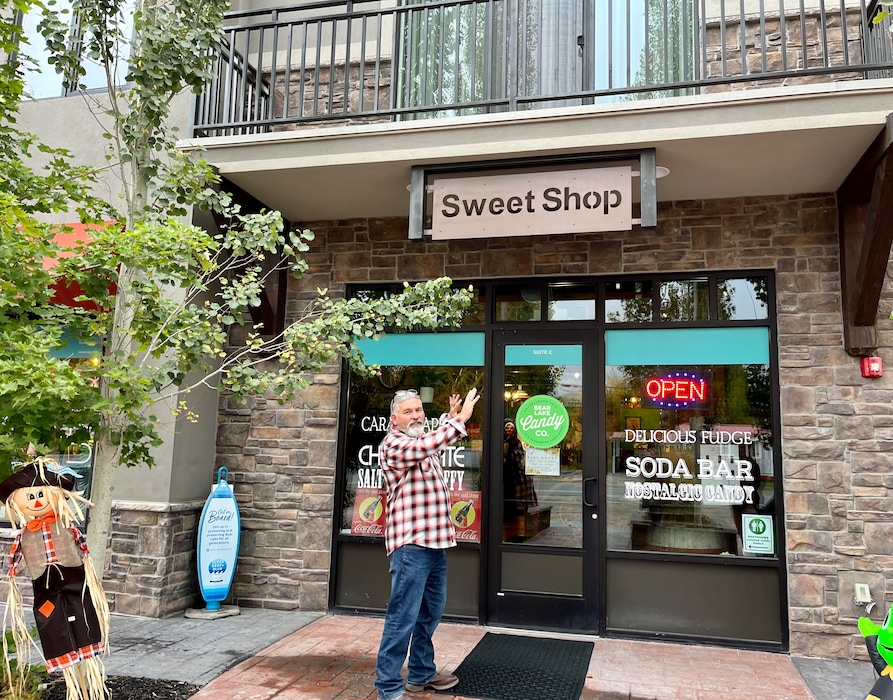 (Shannon Sollitt | The Salt Lake Tribune)  Chris Shurian in front of his candy store, one of four commercial businesses at the entrance to the Water's Edge Resort.