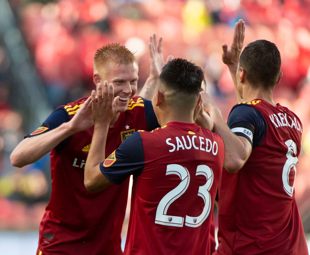 (Rick Egan  |  The Salt Lake Tribune).  Real Salt Lake defender Justen Glad (15) and Real Salt Lake midfielder Damir Kreilach (8) celebrates with Real midfielder Sebastian Saucedo (23) after Saucedo scored a Salt Lake goal, in MLS soccer action between Real Salt Lake and Atlanta United at Rio Tinto Stadium in Sandy, Friday, May 24, 2019.