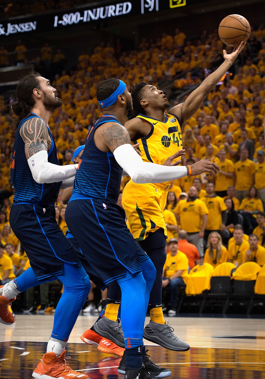 (Scott Sommerdorf | The Salt Lake Tribune)Utah Jazz guard Donovan Mitchell (45) scoops a shot during first quarter play. The Thunder led the Jazz 22-18 at the end of the 1st quarter during Game 6 of the first round playoff game, Friday, April 27, 2018.
