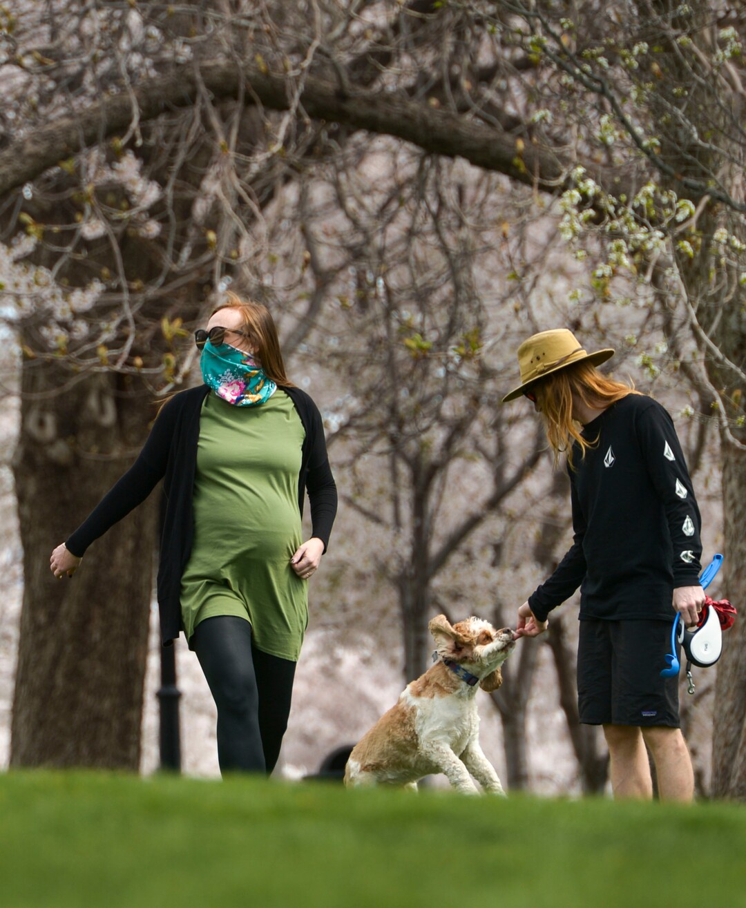 (Leah Hogsten  |  The Salt Lake Tribune) Families take a break from being indoors due to coronavirus precautions to relish in Thursday's sunshine and fresh air on the Capitol grounds, April 9, 2020.