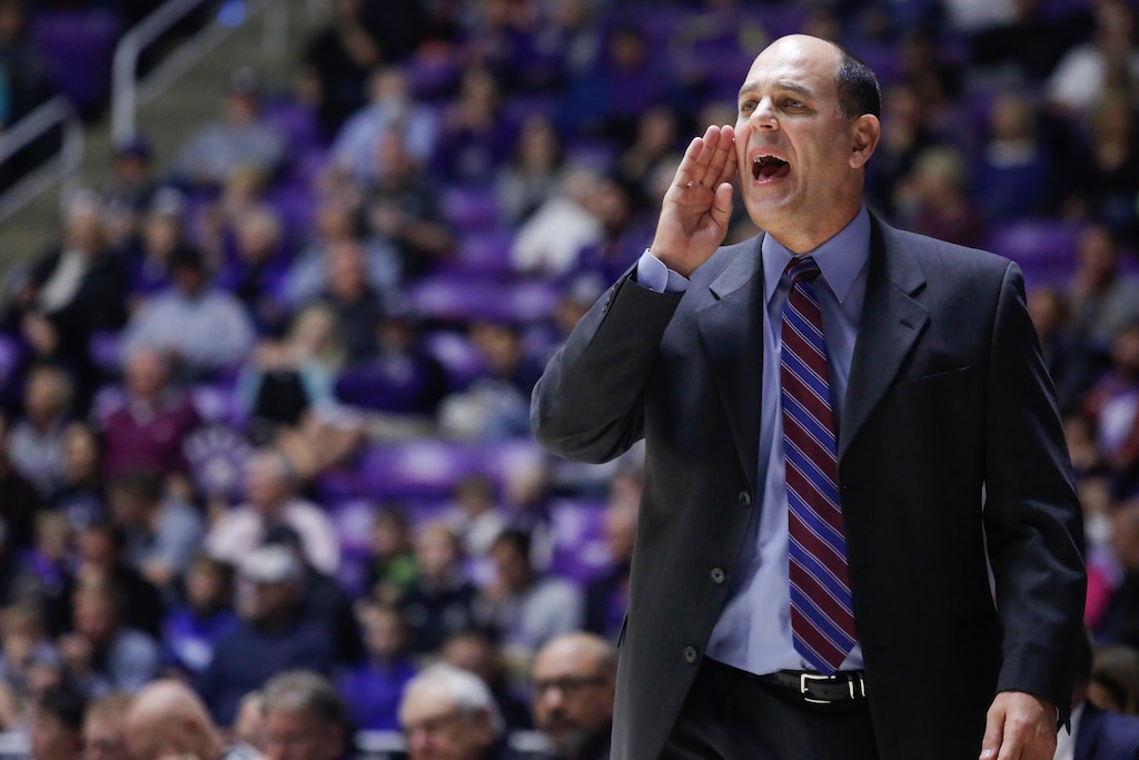 Utah State coach Tim Duryea guides his team during the first half of an NCAA college basketball game against Weber State on Friday, Nov. 10, 2017, in Ogden, Utah. (Matt Herp/Standard-Examiner via AP)