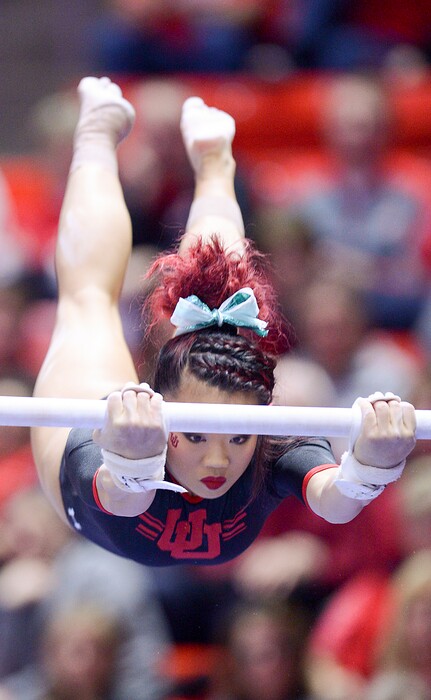 (Leah Hogsten  |  The Salt Lake Tribune) Kari Lee on the bars Utah hosts Arizona State in Women's Gymnastics at Jon M. Huntsman Center, Friday, February 9, 2018. 