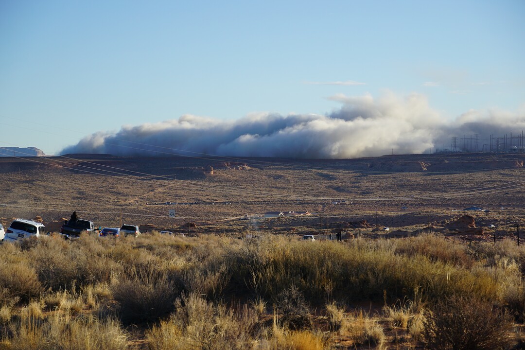 (Zak Podmore | The Salt Lake Tribune) Dust lingered in the air for hours after the demolition of smokestacks on the Navajo Generating Station on December 18, 2020.