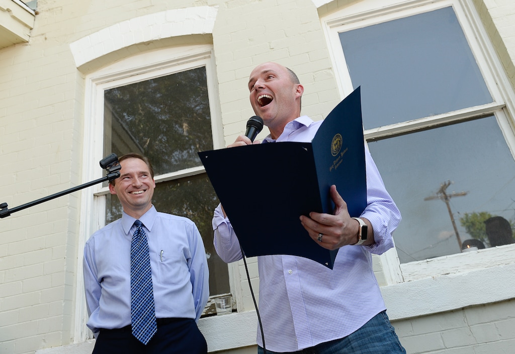 (Francisco Kjolseth | The Salt Lake Tribune) Utah representative Steve Eliason, R-Sandy, left, joins Lt. Gov. Spencer Cox as he reads loud, a formal proclamation by Utah Gov. Gary Herbert, declaring July 28, 2018 as "LoveLoud Day in Utah" in honor of the LoveLoud Festival, an event celebrating and supporting LGBT youth. Musicians, advocates of the LGBT community, lawmakers and friends gathered in Salt Lake City for the LoveLoud kickoff on Friday, July 27, 2018.