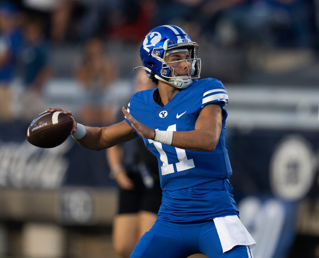 (Rick Egan | The Salt Lake Tribune) Brigham Young Cougars quarterback Cade Fennegan (11) warms up before the game between the Brigham Young Cougars and the Baylor Bears, at Lavell Edwards Stadium, on Saturday, Sept. 10, 2022.