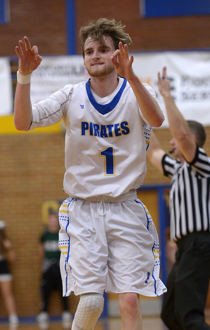 (Leah Hogsten | The Salt Lake Tribune) Cyprus' Alex Foster celebrates after hitting back to back 3-pointers in the game. Cyprus High School boys' basketball team defeated Hillcrest High School 77-61 during their game Tuesday, January 30, 2018 in Magna.