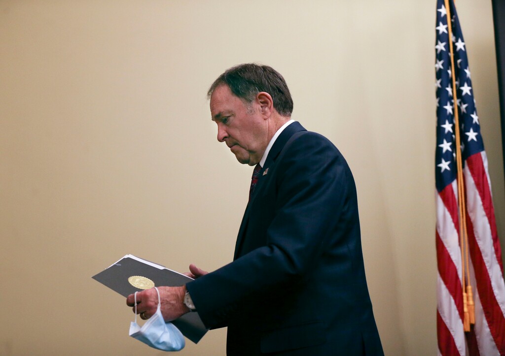 (Laura Seitz | Deseret News, pool) Gov. Gary Herbert leaves a COVID-19 briefing at the Capitol in Salt Lake City on Thursday, Nov. 12, 2020. 