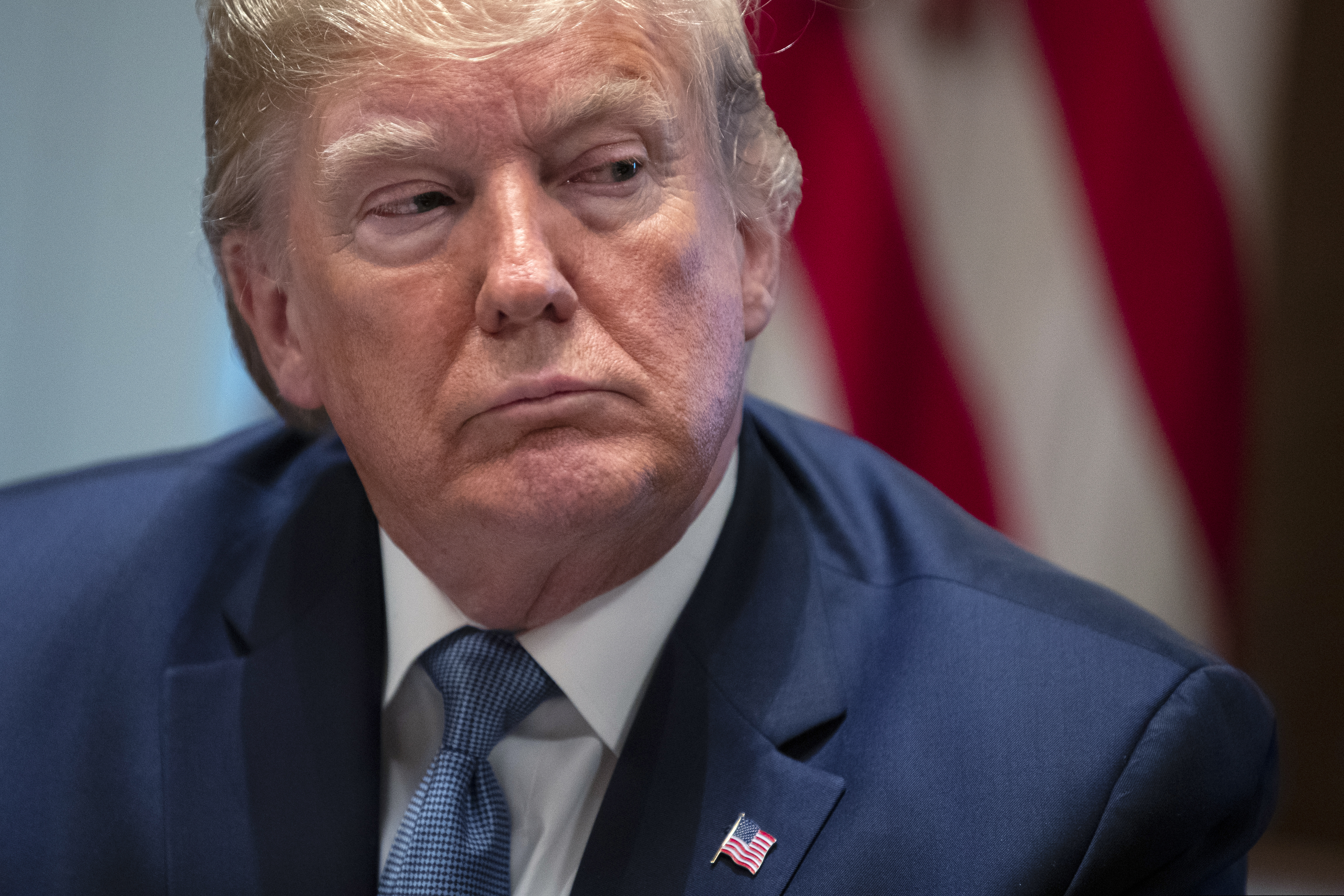 (Evan Vucci | AP) President Donald Trump listens during a roundtable on school choice in the Cabinet Room of the White House, Monday, Dec. 9, 2019, in Washington.