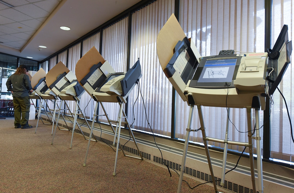 (Francisco Kjolseth  |  The Salt Lake Tribune)  People arrive to vote at the Salt Lake County complex for primary election day on Tuesday, June 26, 2018.