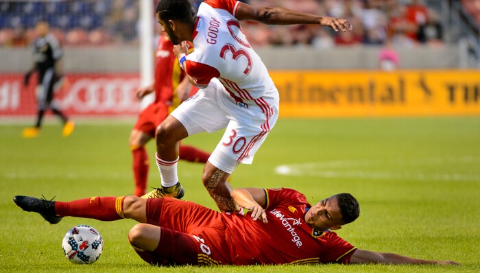 (Steve Griffin | The Salt Lake Tribune) Real Salt Lake midfielder Luis Silva (20) tackles San Jose's Anibal Godoy during match at Rio Tinto Stadium in Sandy Wednesday August 23, 2017.