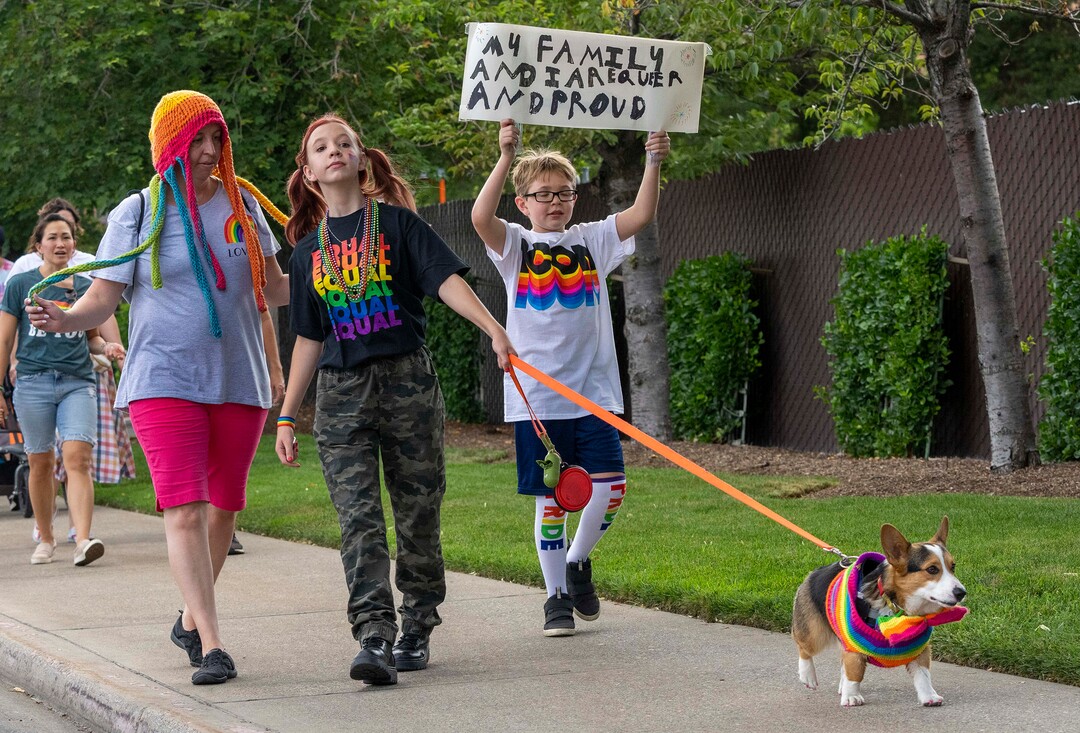 (Rick Egan | The Salt Lake Tribune)  Laurel Arnold, walks with her kids, Lilly, 14, and Sam 12, and dog Tucker, march along with BYU students, friends and allies in a Pride March, to Kiwanis Park, in Provo, on Monday, June 28, 2021.