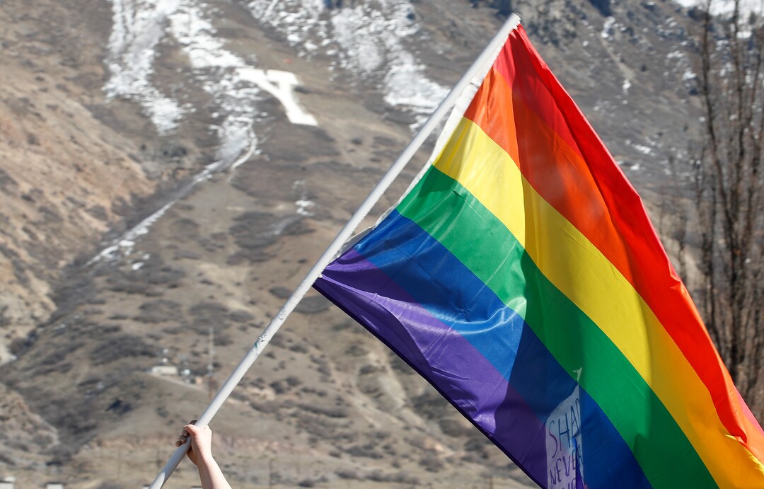 (George Frey  |  special to The Salt Lake Tribune) BYU students and others gather in front of the Ernest L. Wilkinson Student Center on the campus of Brigham Young University to protest BYUÕs rollback of a newly announced policy change on LGBTQ students on March 5, 2020 in Provo, Utah.